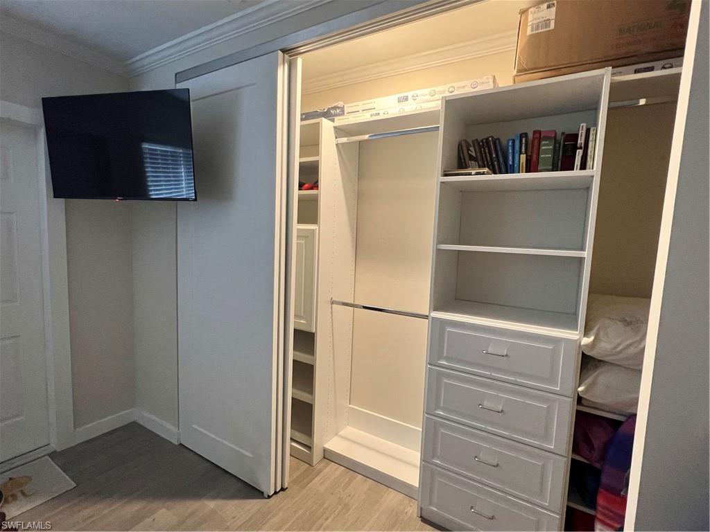 473 12th Avenue South, Unit B6 Naples, FL 34102 - Photo 7 of 10 a view of walk in closet