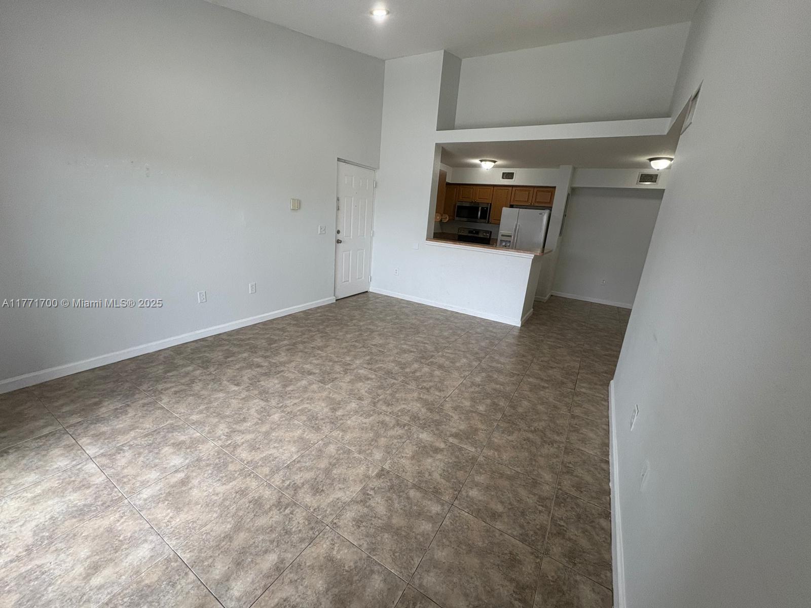 15422 Southwest 284th Street, Unit 7302 Homestead, FL 33033 - Photo 14 of 44 a view of empty room