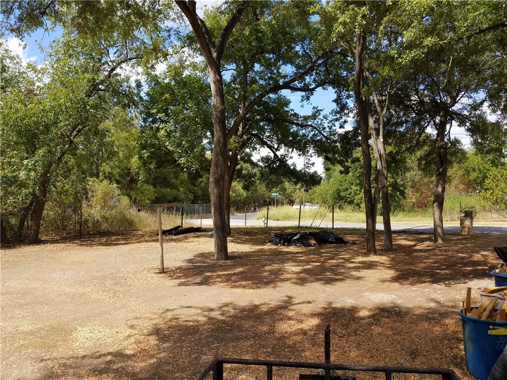 5405 Hudson Street Austin, TX 78721 - Photo 4 of 37 A spacious, tree-canopied lot awaits your vision for a new home.
