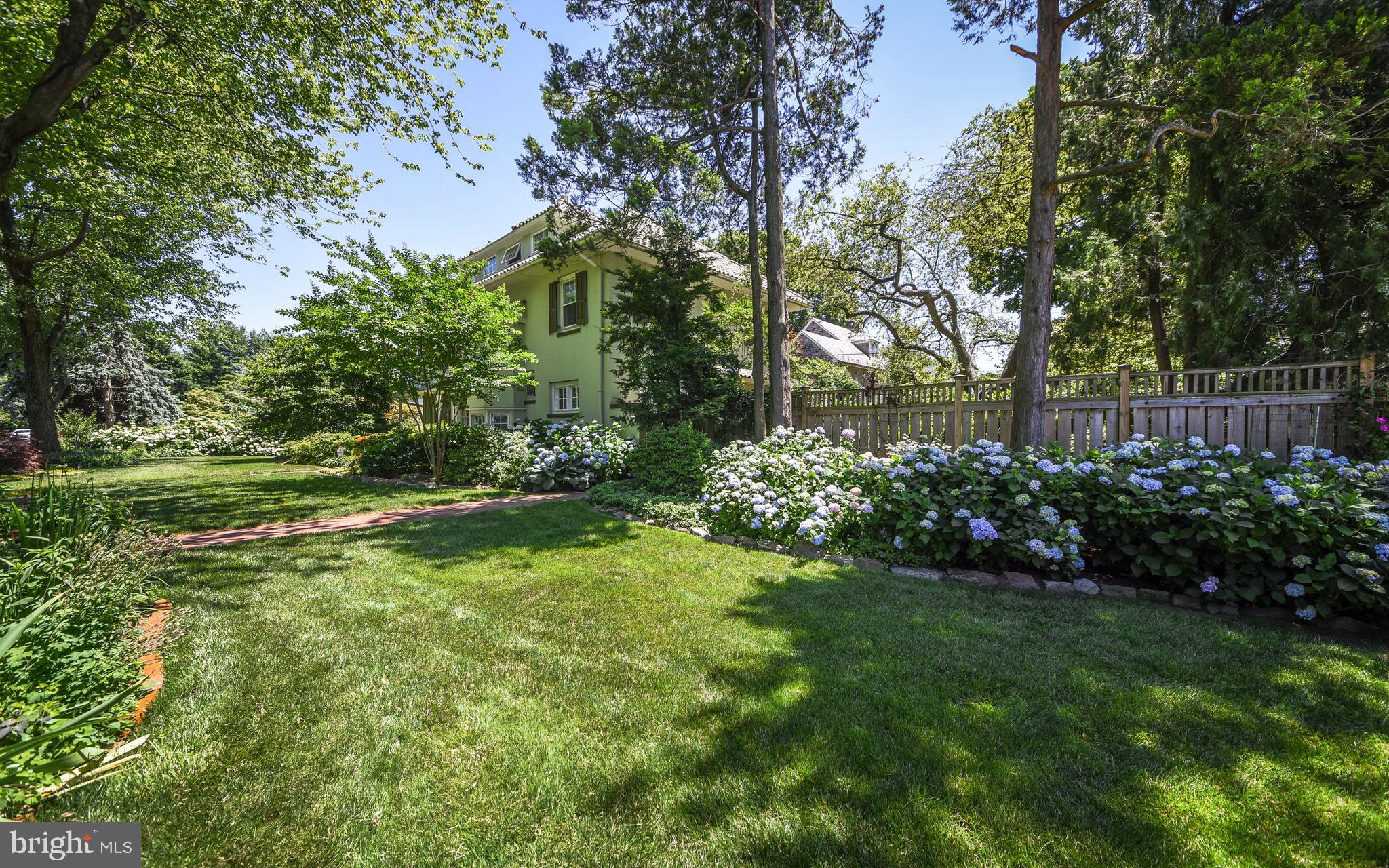 407 Vernon Road Jenkintown, PA 19046 - Photo 5 of 57 a view of a garden with a fountain
