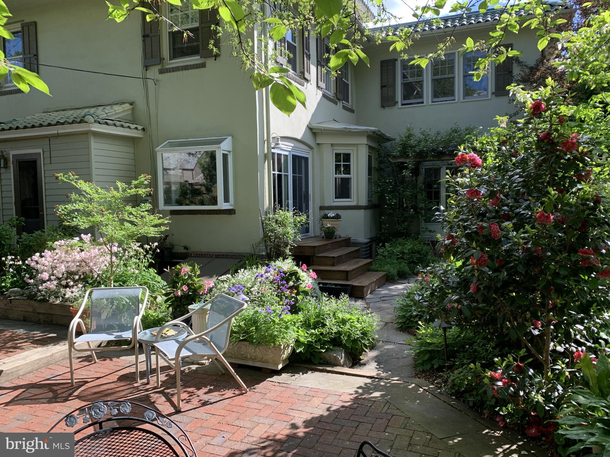 407 Vernon Road Jenkintown, PA 19046 - Photo 50 of 57 a couple of table and chairs in front of house