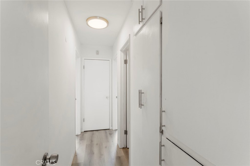 5535 Ackerfield Avenue, Unit 8 Long Beach, CA 90805 - Photo 14 of 31 a view of a hallway