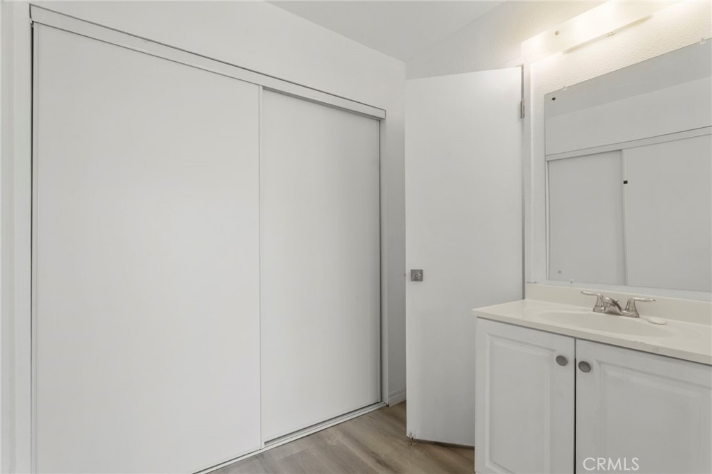 5535 Ackerfield Avenue, Unit 8 Long Beach, CA 90805 - Photo 22 of 31 a bathroom with a shower and a sink