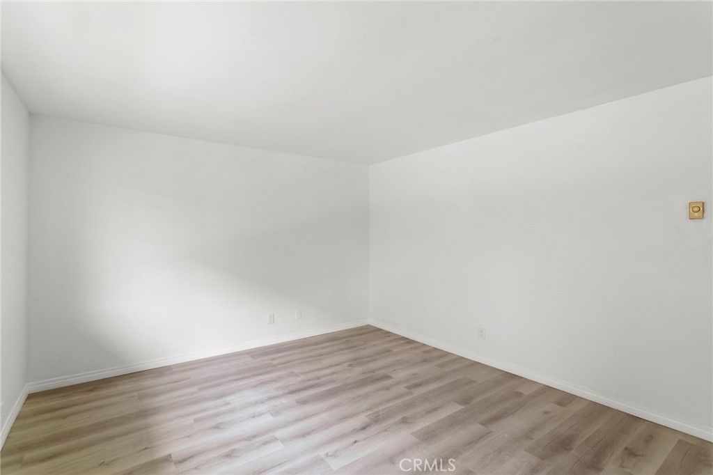 5535 Ackerfield Avenue, Unit 8 Long Beach, CA 90805 - Photo 6 of 31 a view of an empty room