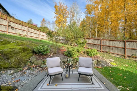 a view of a chairs and table on the terrace