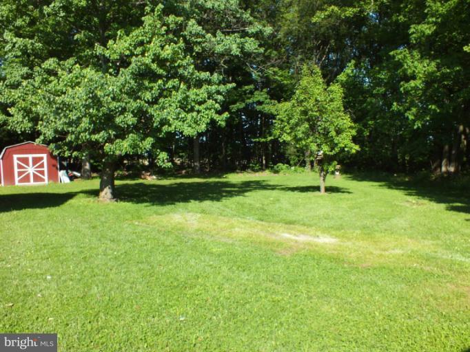 4835 Maple Grove Road Hampstead, MD 21074 - Photo 1 of 27 a view of an outdoor space and yard