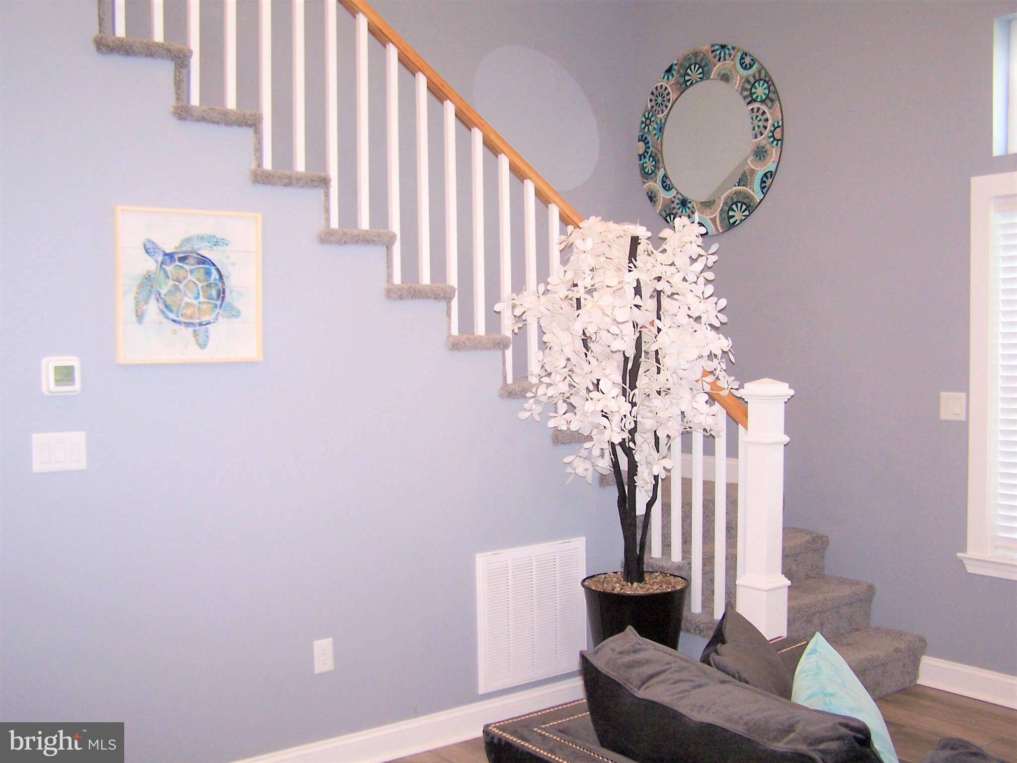 199 Clamshell Road Ocean City, MD 21842 - Photo 13 of 65 Staircase Leading to 2nd Level