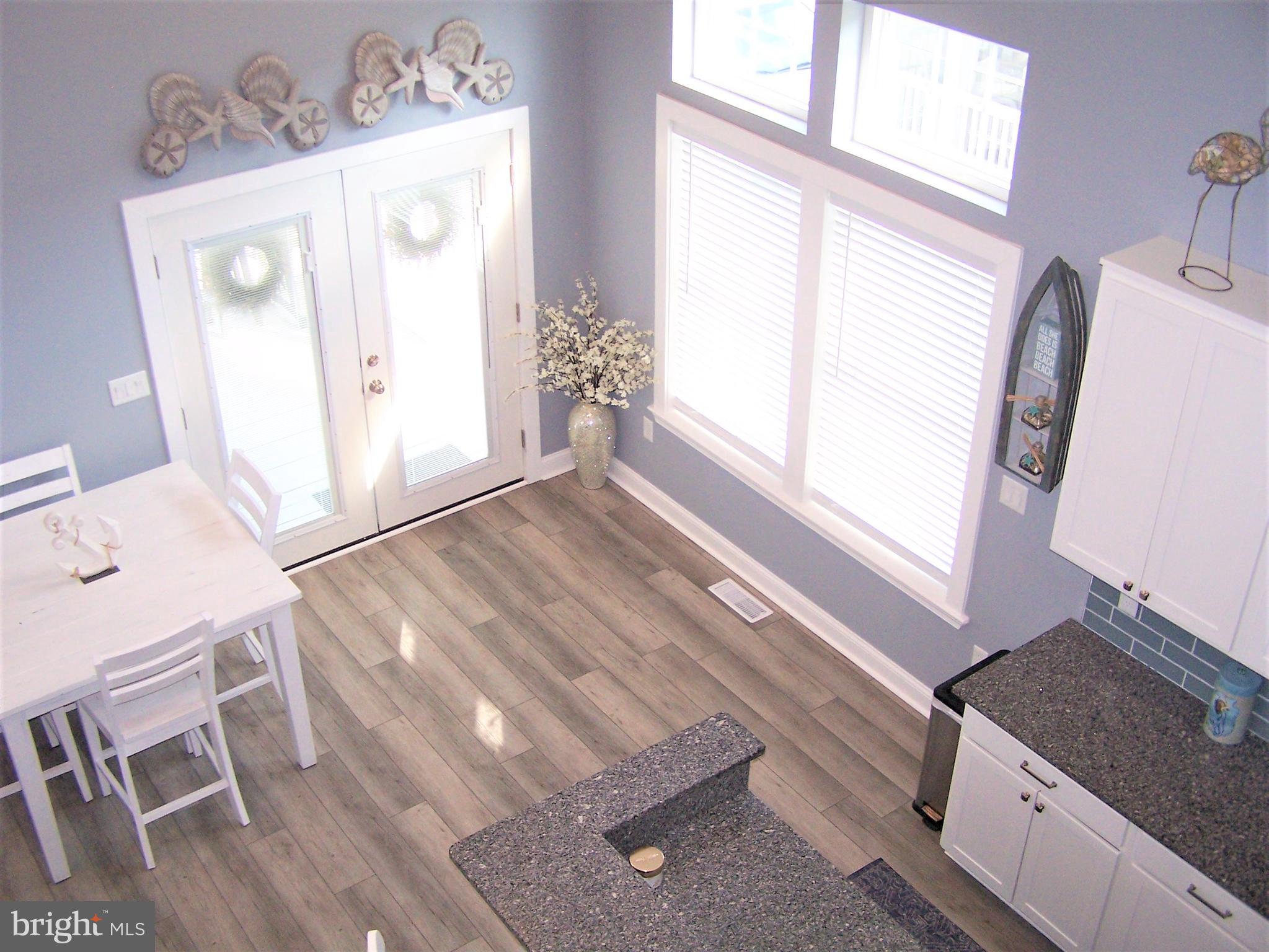 199 Clamshell Road Ocean City, MD 21842 - Photo 41 of 65 View of Kitchen/Dining Area from Upstairs