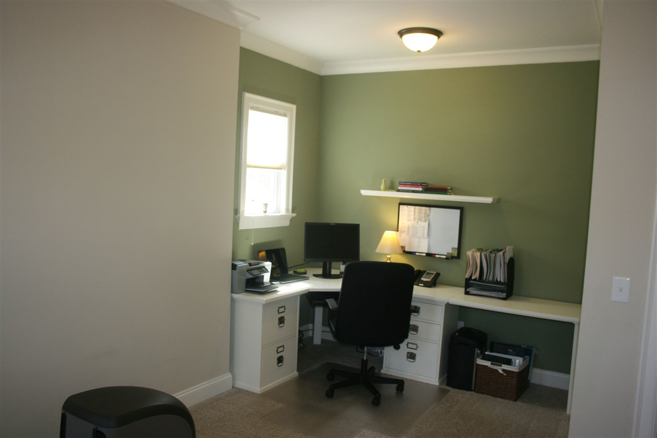 2 Hidden Ridge Court Durham, NC 27707 - Photo 7 of 25 Situated just off the kitchen and adjacent to powder room is the main level office which measures 16.8' x 12'. Office/Study
