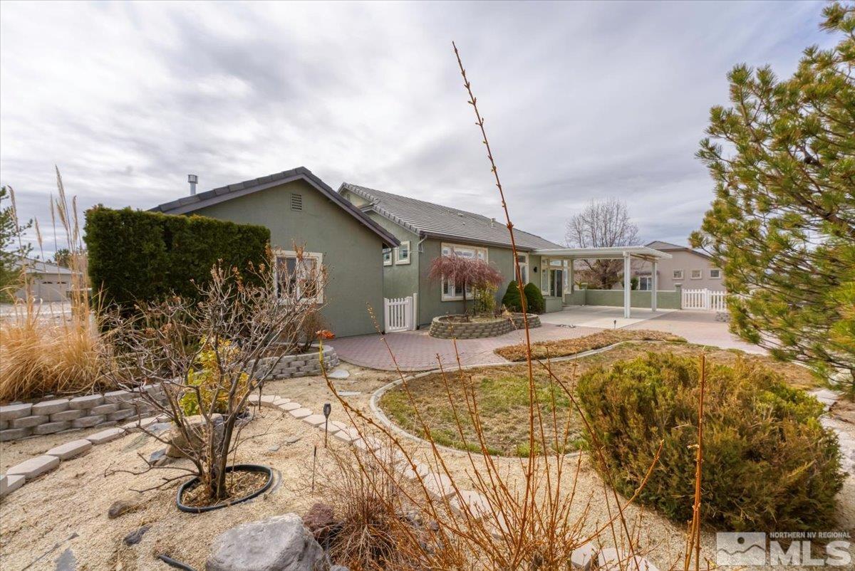 1900 Hidden Meadows Drive Reno, NV 89502 - Photo 32 of 37 a view of a house with backyard and sitting area