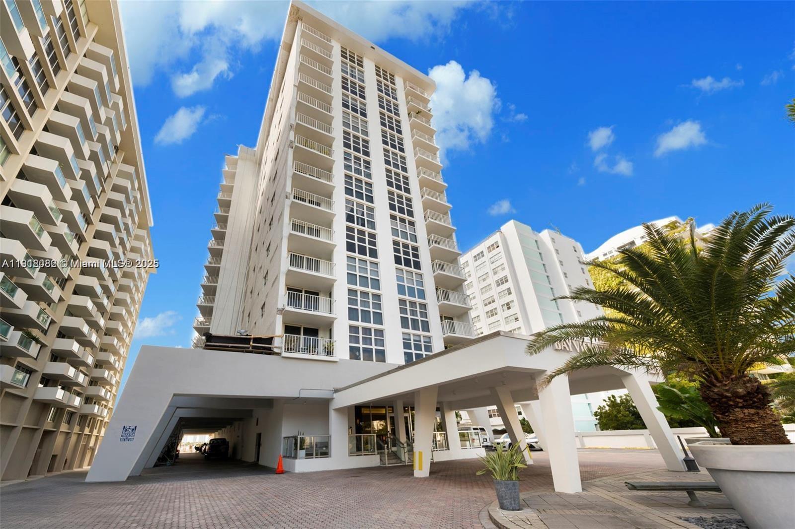 1228 West Avenue, Unit 911 Miami Beach, FL 33139 - Photo 21 of 24 a view of a building with a street