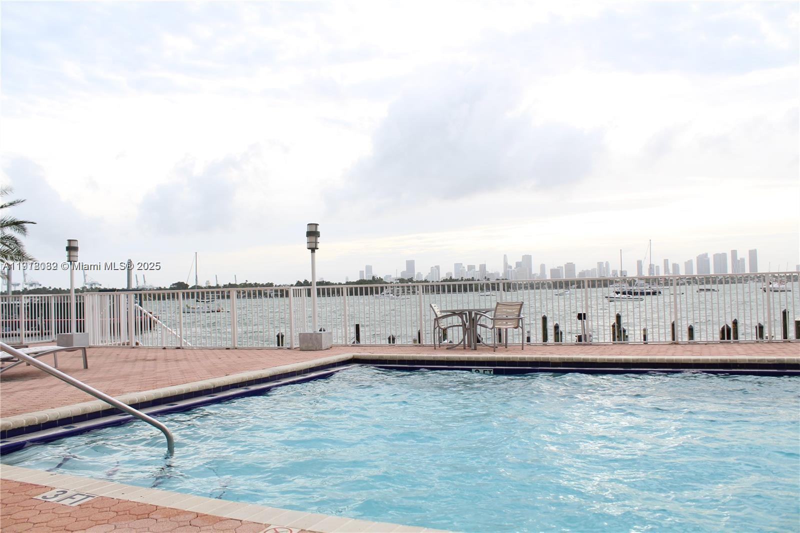1228 West Avenue, Unit 911 Miami Beach, FL 33139 - Photo 23 of 24 a view of a terrace with sitting space