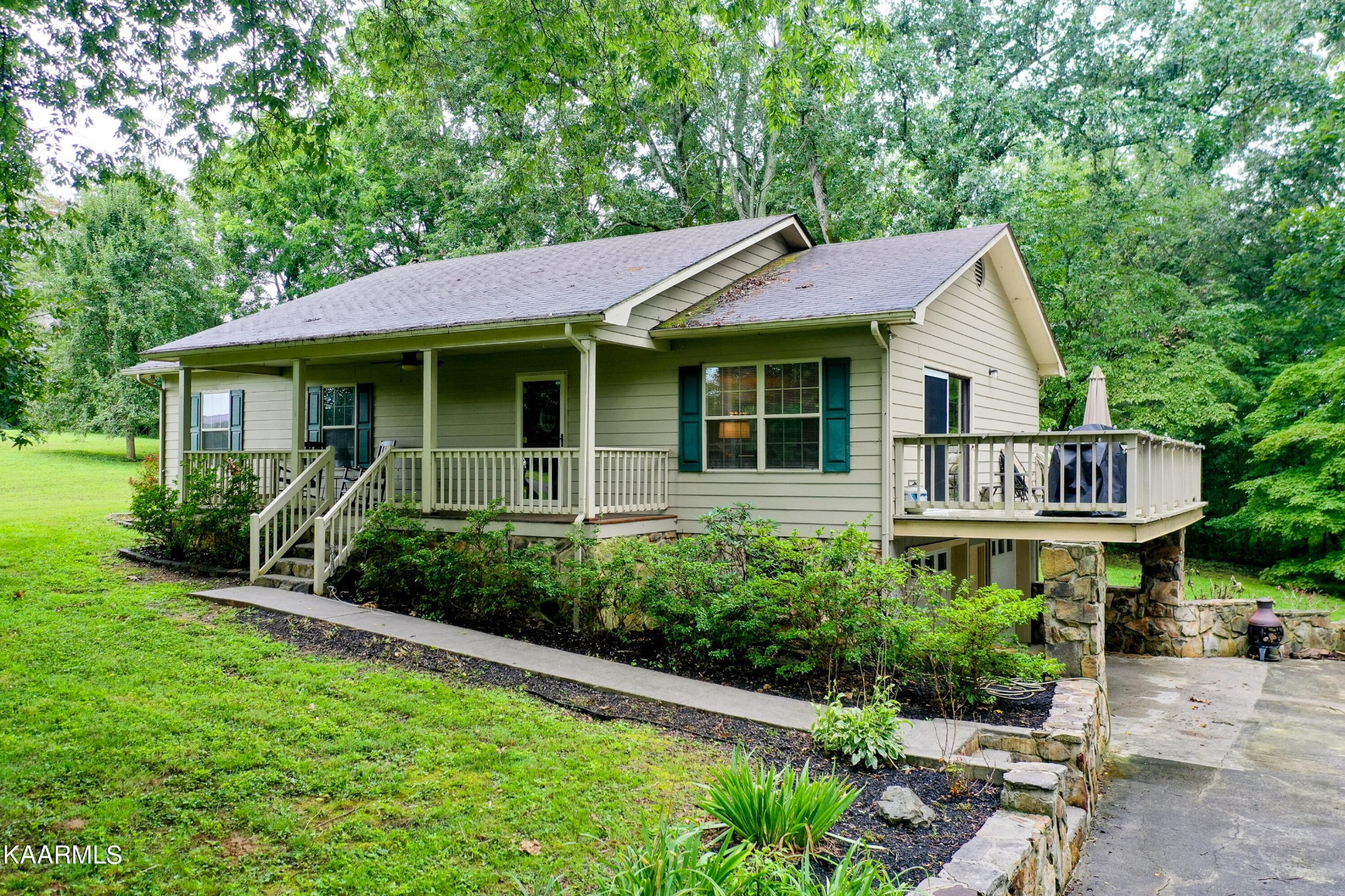 a house with trees in the background