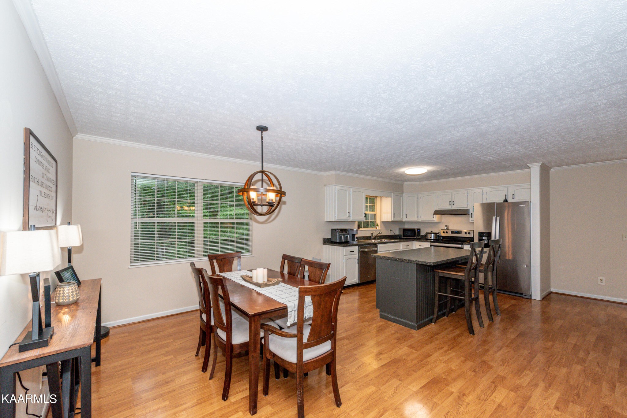 125 Lakeview Estates Road Vonore, TN 37885 - Photo 21 of 46 a view of a dining room with furniture window and wooden floor