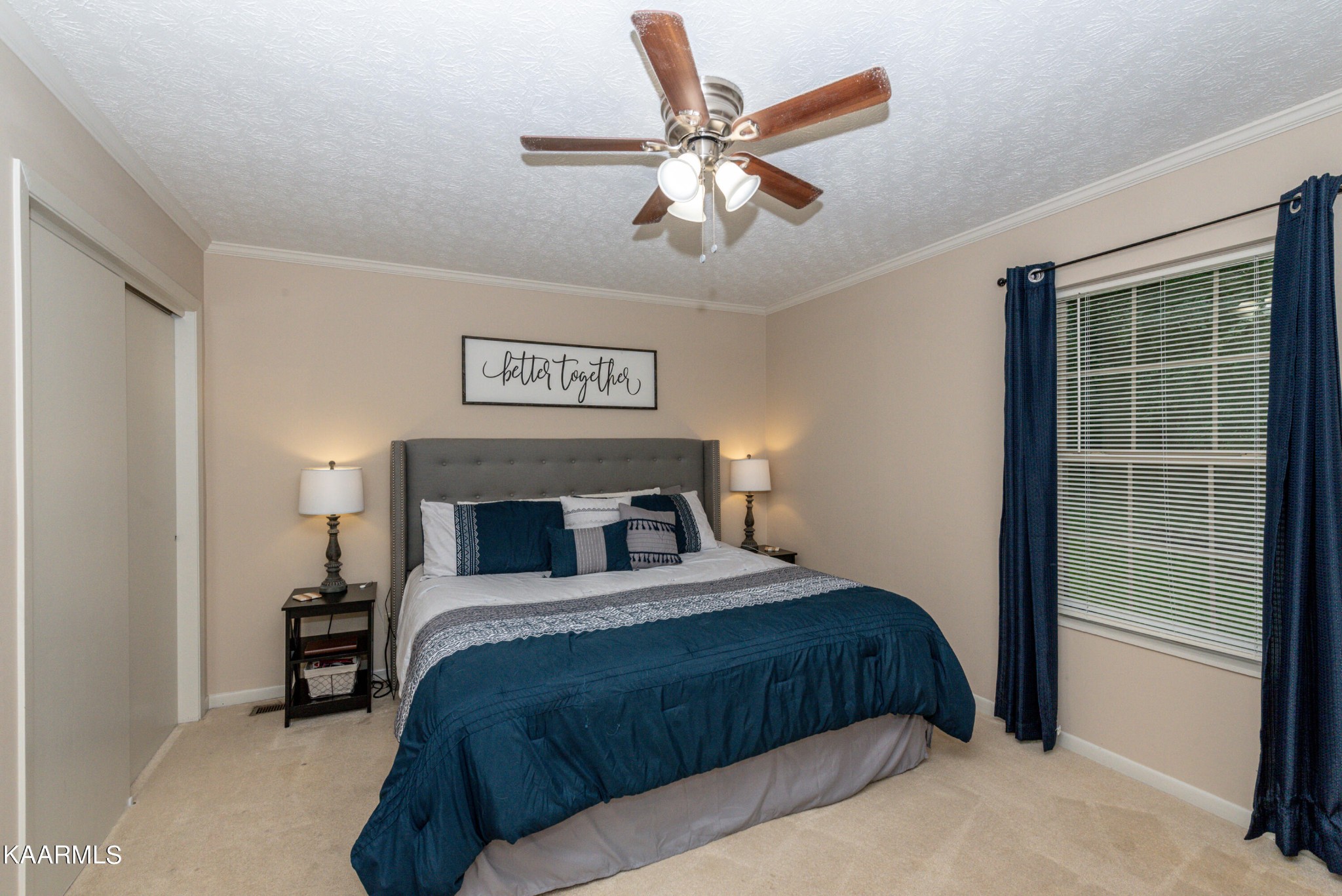 125 Lakeview Estates Road Vonore, TN 37885 - Photo 24 of 46 a bedroom with a large bed and a window