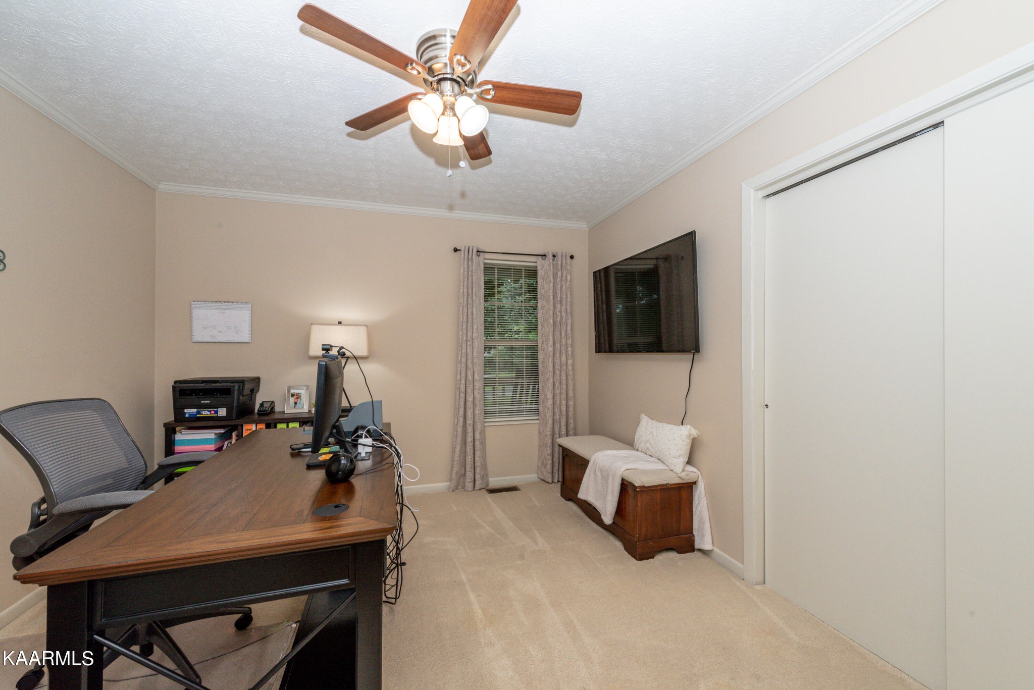 125 Lakeview Estates Road Vonore, TN 37885 - Photo 28 of 46 a bedroom with furniture and a bed