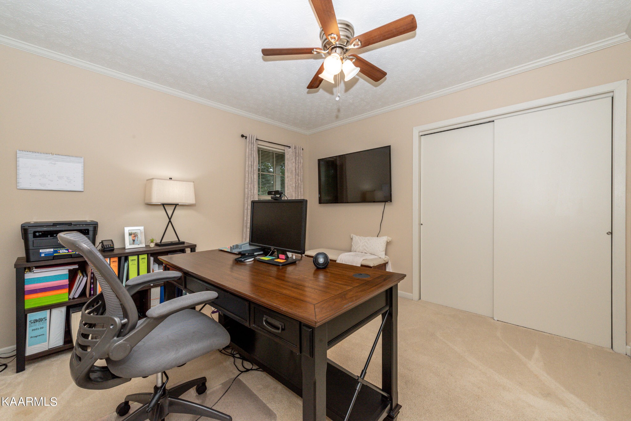 125 Lakeview Estates Road Vonore, TN 37885 - Photo 29 of 46 a view of a workspace with furniture and a ceiling fan