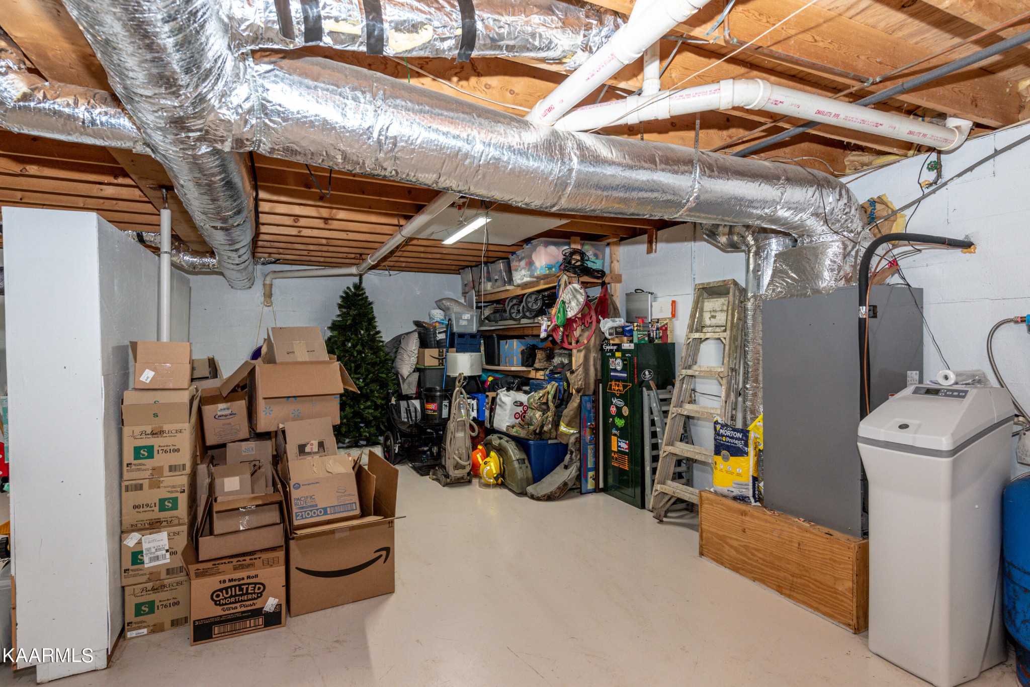125 Lakeview Estates Road Vonore, TN 37885 - Photo 35 of 46 a view of a storage room with a lot of stuff