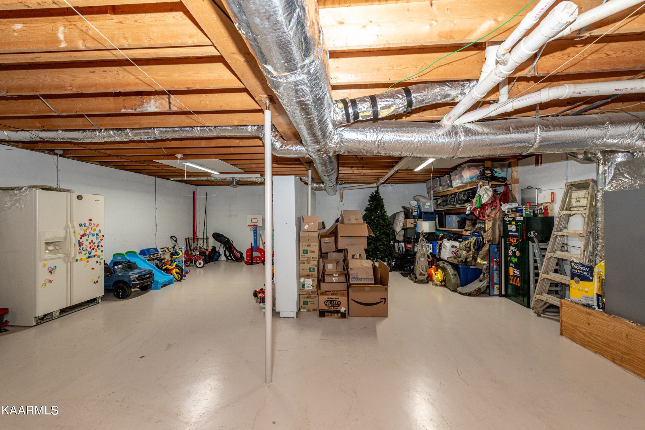 125 Lakeview Estates Road Vonore, TN 37885 - Photo 36 of 46 a view of a storage room with a lot of stuff