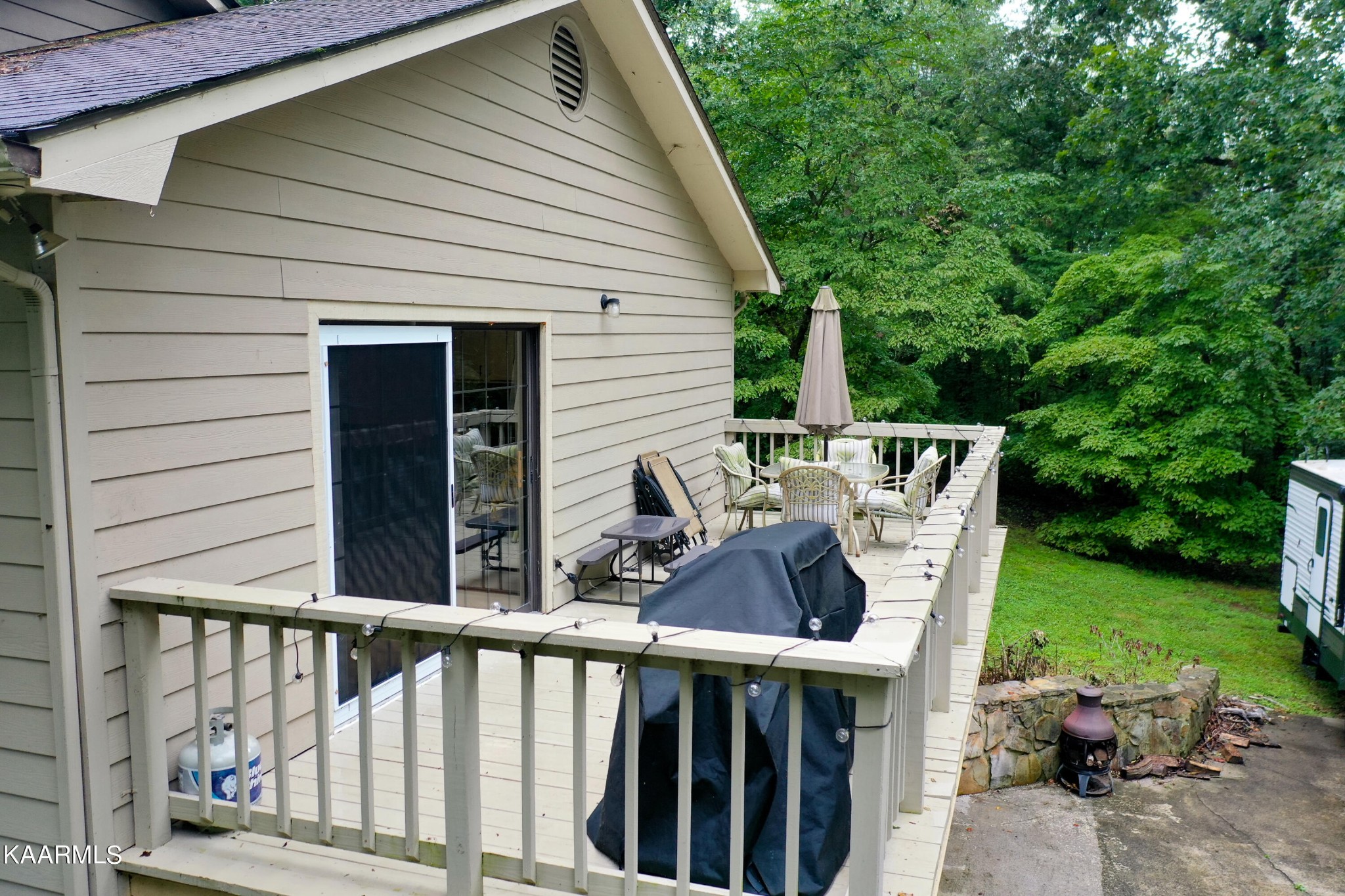 125 Lakeview Estates Road Vonore, TN 37885 - Photo 40 of 46 a view of deck with furniture and garden