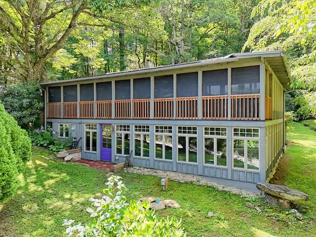 a view of front of house with a yard