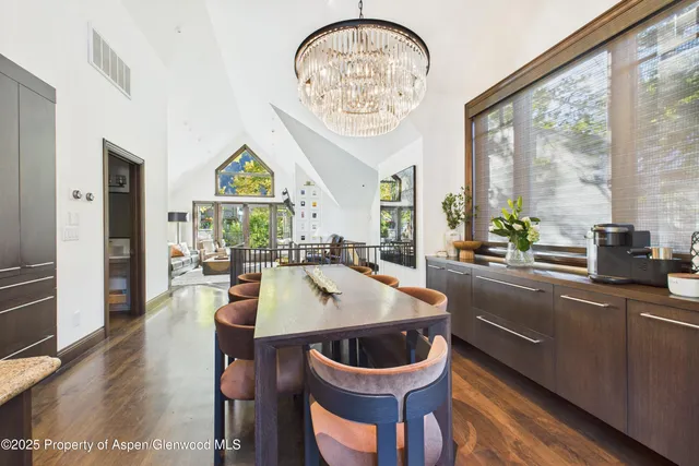 a spacious bedroom with a bed and furniture