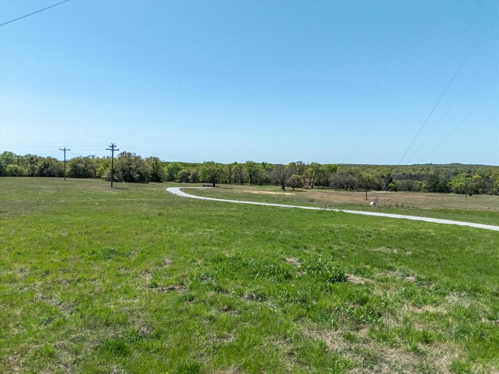 900 Old Spring Road Nocona, TX 76255 - Photo 25 of 27 a view of a field with outside view