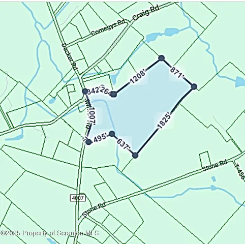 a picture of white wall with a building in the background