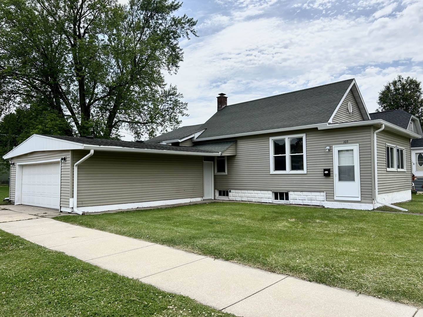 a backyard of a house with lots of green space