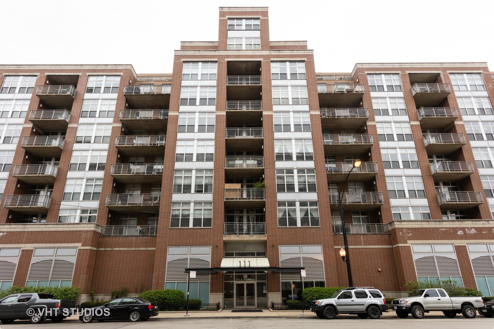 111 South Morgan Street, Unit 609 Chicago, IL 60607 - Photo 1 of 12 front view of a building