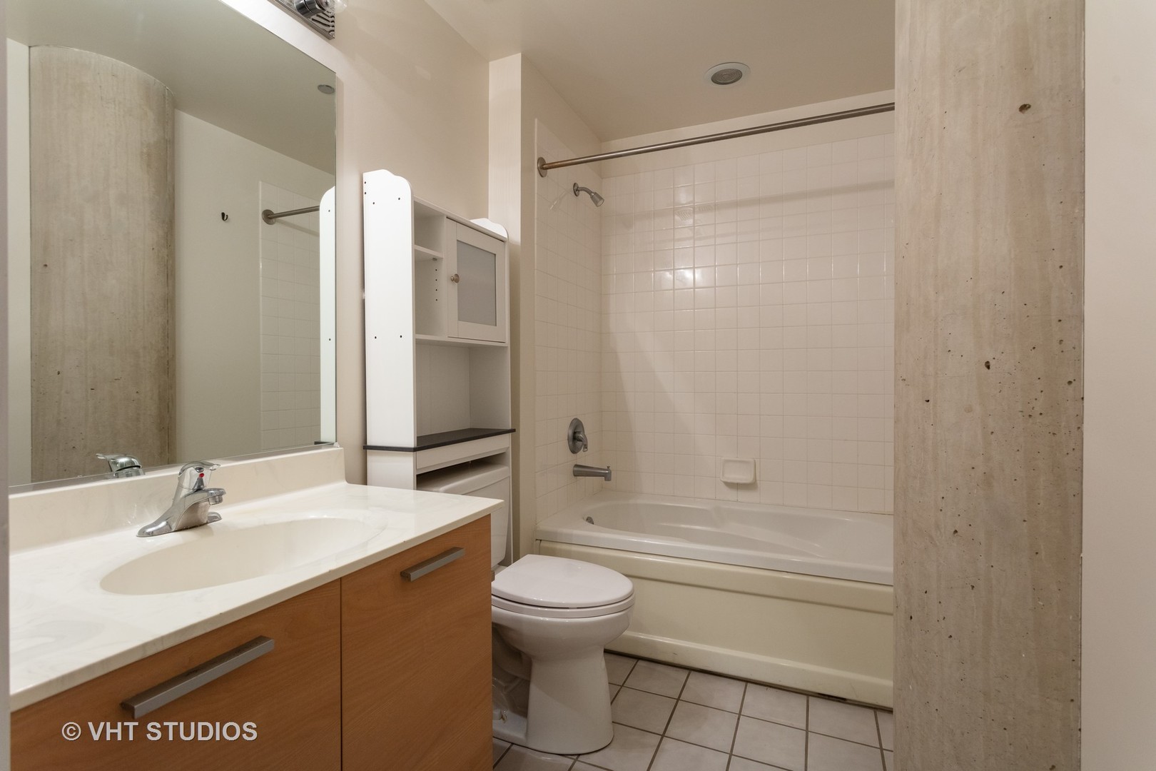 111 South Morgan Street, Unit 609 Chicago, IL 60607 - Photo 11 of 12 a bathroom with a sink toilet and shower