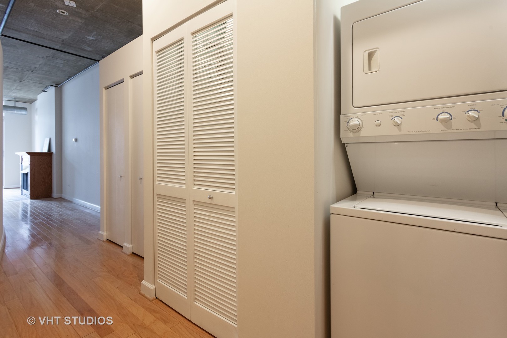 111 South Morgan Street, Unit 609 Chicago, IL 60607 - Photo 12 of 12 a close view of a utility room with washer and dryer