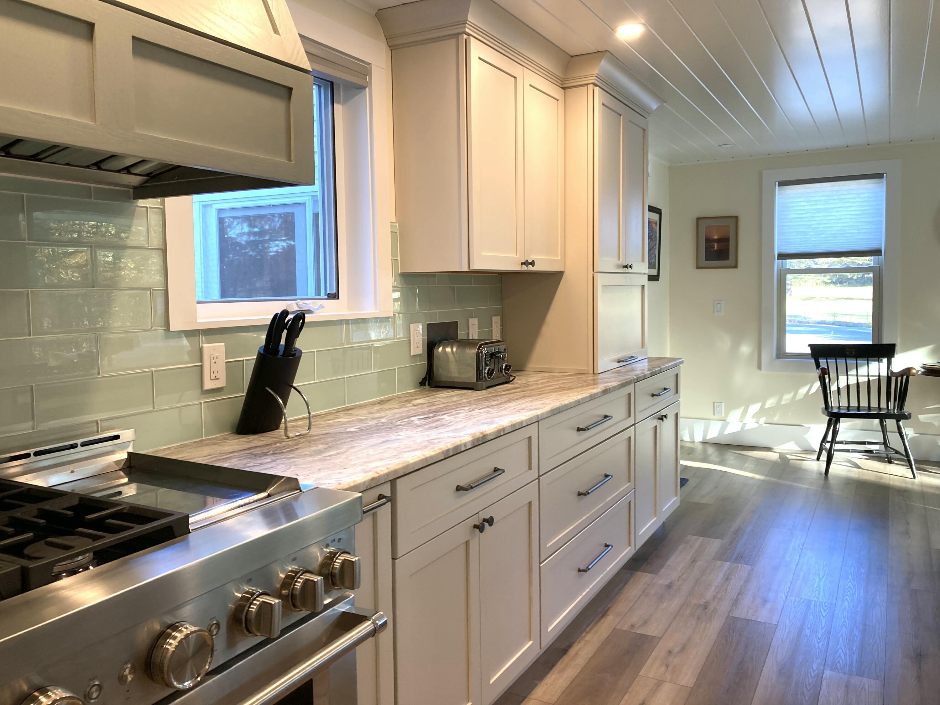 122 Cross Road Hancock, ME 04640 - Photo 12 of 45 Counter tops of polished granite.