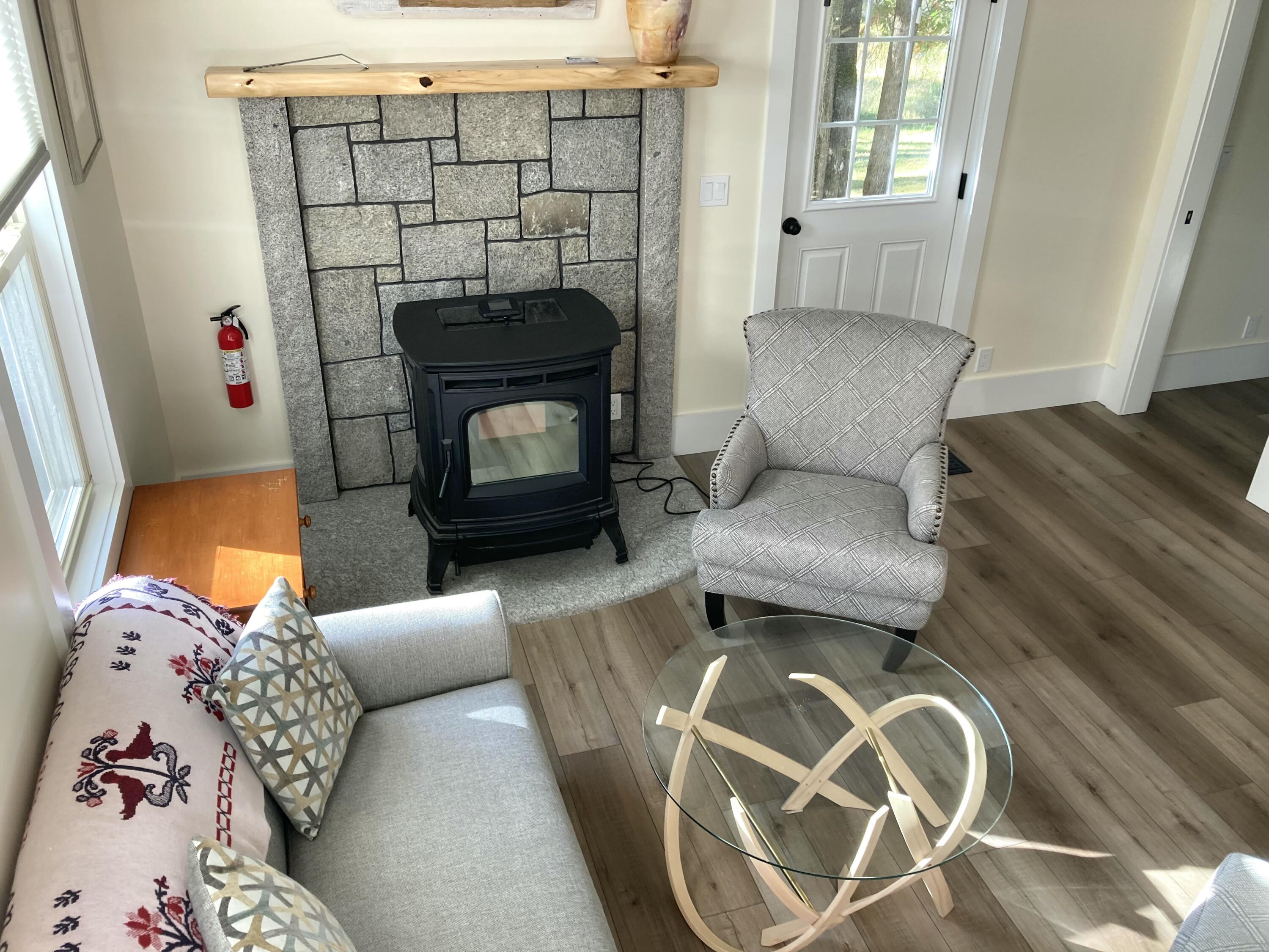 122 Cross Road Hancock, ME 04640 - Photo 21 of 45 Living room from stair landing.