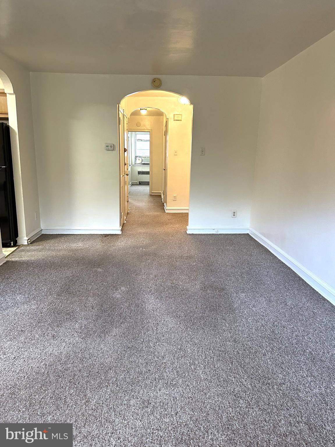 a view of a big room with a fireplace