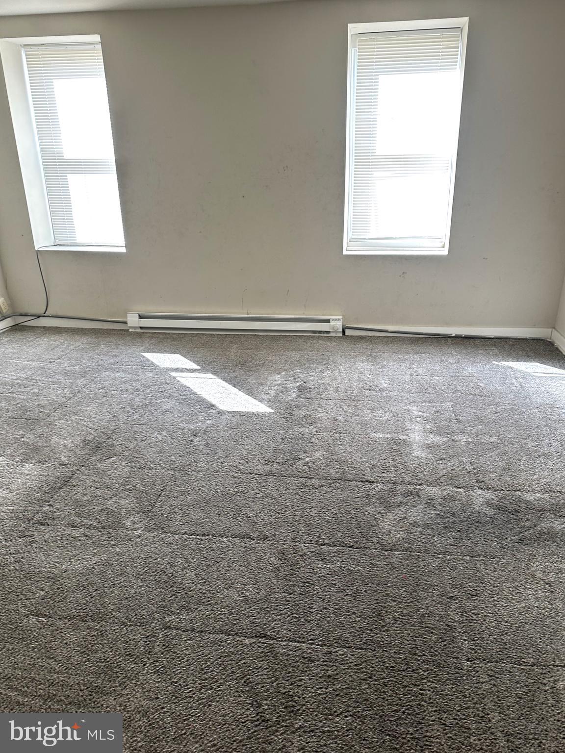 4934 Wynnefield Avenue, Unit 2 Philadelphia, PA 19131 - Photo 11 of 26 an empty room with a window