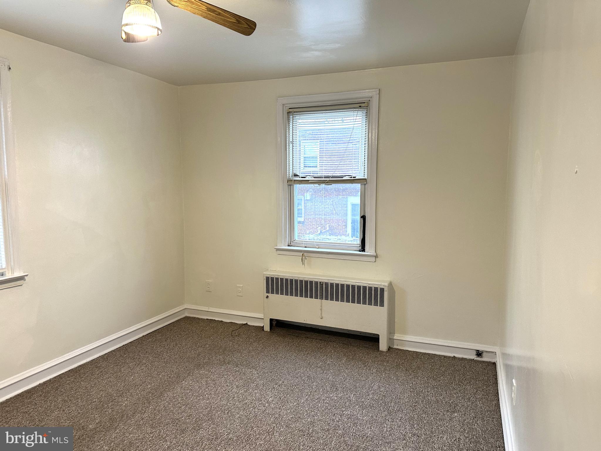 4934 Wynnefield Avenue, Unit 2 Philadelphia, PA 19131 - Photo 21 of 26 an empty room with a window