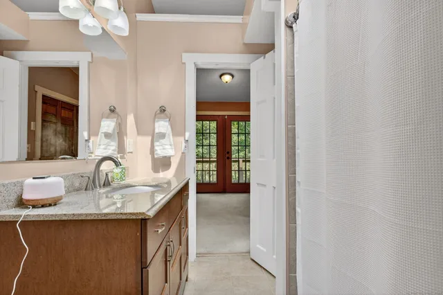 a bedroom with a bed and closet