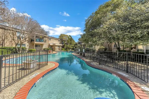 a view of a houses with a park