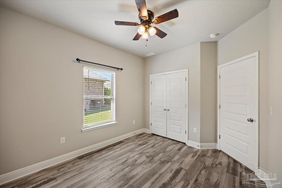 8056 Stream Ridge Road Pensacola, FL 32526 - Photo 34 of 66 a view of an empty room with a window
