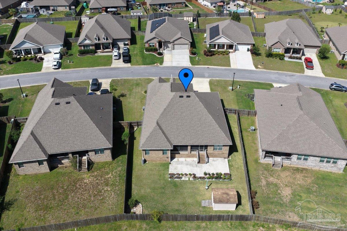 8056 Stream Ridge Road Pensacola, FL 32526 - Photo 60 of 66 an aerial view of houses with outdoor space