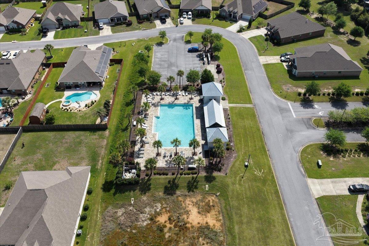8056 Stream Ridge Road Pensacola, FL 32526 - Photo 62 of 66 an aerial view of residential house with outdoor space and swimming pool