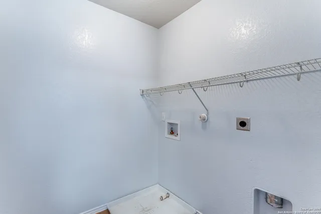 a bathroom with a shower and a shower head