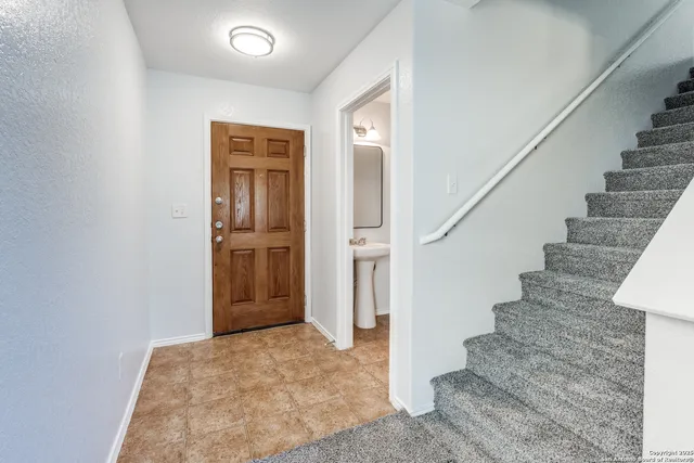 a view of entryway with wooden floor