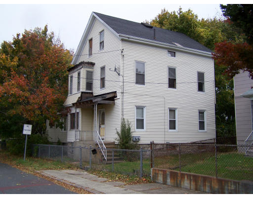 596 Orswell Street Fall River, MA 02721 - Photo 1 of 1 a view of a white house with large windows next to a yard