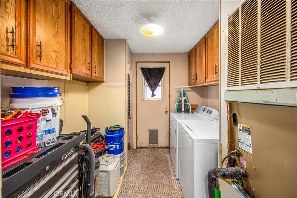 7717 Church Street, Unit 160 Highland, CA 92346 - Photo 18 of 37 a view of storage and utility room
