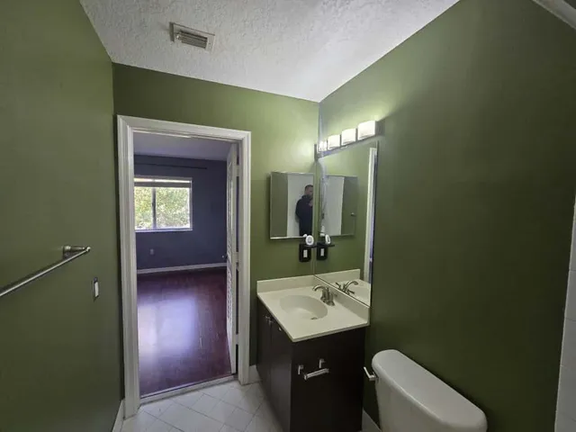 a view of a room with racks on the wall