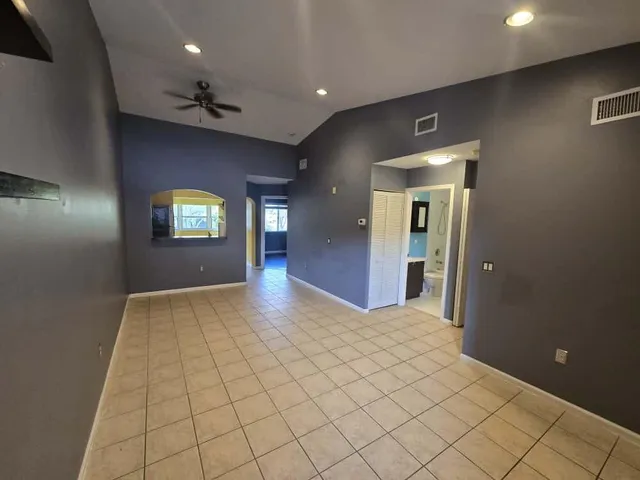 an empty room with windows