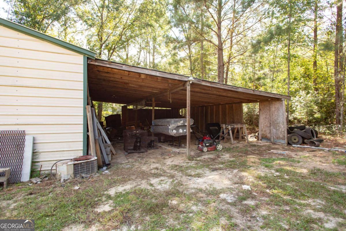 4535 Oak View Circle Waycross, GA 31503 - Photo 33 of 33 a view of a house with backyard