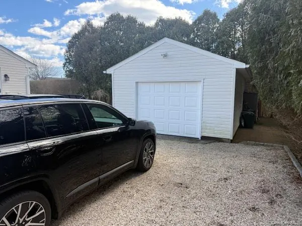 a view of backyard with cabin